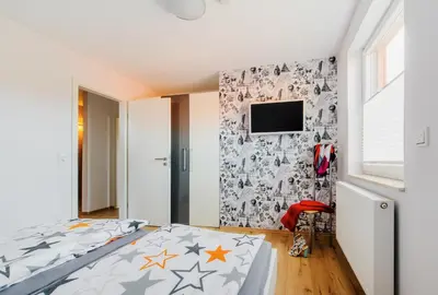 Ein Bett oder Betten in einem Zimmer der Unterkunft Ferienhaus Hödur