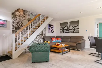 Ein Sitzbereich in der Unterkunft Premium-Plus-Ferienhaus Havanna Select