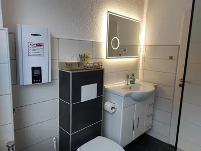 Ein Badezimmer in der Unterkunft Ferienwohnung Schloepe god