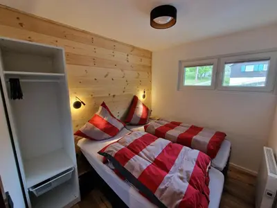 Ein Bett oder Betten in einem Zimmer der Unterkunft gemütliche moderne Ferienwohnung inkl. WLAN in St Andreasberg/Braunlange