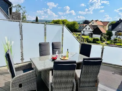 Ein Balkon oder eine Terrasse in der Unterkunft FeWo Bachlauf mit großer Terrasse von Harztraveler