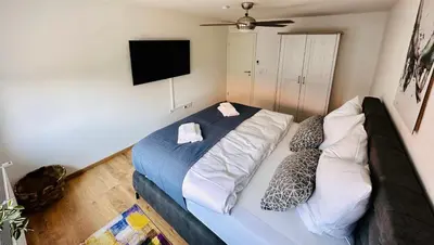 Ein Bett oder Betten in einem Zimmer der Unterkunft FeWo Bachlauf mit großer Terrasse von Harztraveler