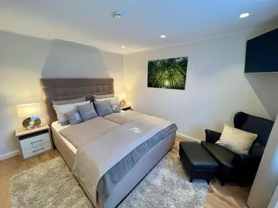 Ein Bett oder Betten in einem Zimmer der Unterkunft Haus-Holiday Walkenried/ Harz -Fewo 1-