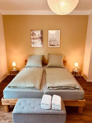 Ein Bett oder Betten in einem Zimmer der Unterkunft Ferienwohnung Kaiserglück