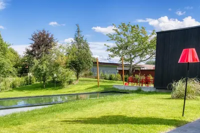 Ein Garten an der Unterkunft Wohnung mit Pool Little King, Little Dagobert