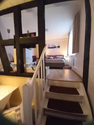 Ein Bett oder Betten in einem Zimmer der Unterkunft Ferienwohnungen Treseburg 