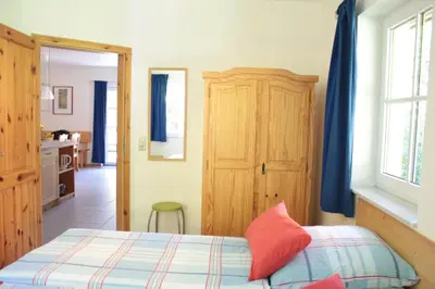 Ein Bett oder Betten in einem Zimmer der Unterkunft Ferienwohnung Ferienhäuser am Brocken, 60 qm 2 Schlafzimmer