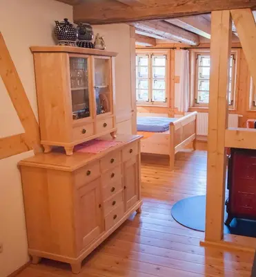 Ein Bett oder Betten in einem Zimmer der Unterkunft Ferienwohnung direkt Am kleinsten Haus in Wernigerode