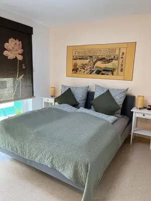 Ein Bett oder Betten in einem Zimmer der Unterkunft Ferienwohnung Schmidt