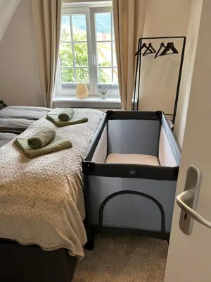 Ein Bett oder Betten in einem Zimmer der Unterkunft Harzburgliving Wohnung Goethe`s Auszeit