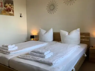 Ein Bett oder Betten in einem Zimmer der Unterkunft Ferienwohnung Harzblick 4