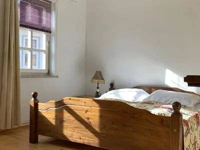 Ein Bett oder Betten in einem Zimmer der Unterkunft Haus Anastasia