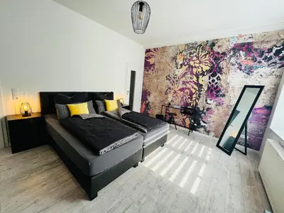 Ein Bett oder Betten in einem Zimmer der Unterkunft HarzFokus - Happynest - #Netflix#Wlan#Zentrum