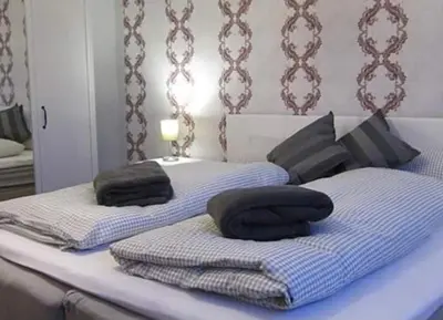 Ein Bett oder Betten in einem Zimmer der Unterkunft Ferienwohnung Laura