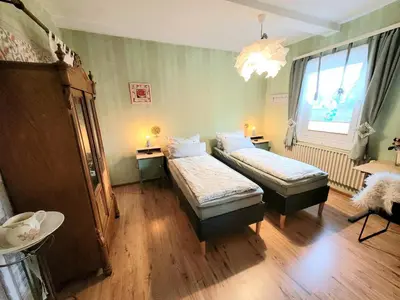 Ein Bett oder Betten in einem Zimmer der Unterkunft Ferienwohnung Laura
