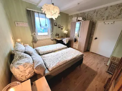 Ein Bett oder Betten in einem Zimmer der Unterkunft Ferienwohnung Laura