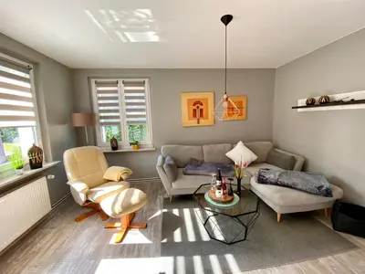 Ein Sitzbereich in der Unterkunft Ferienhaus am Schloßpark