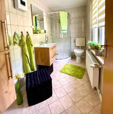 Ein Badezimmer in der Unterkunft Ferienhaus am Schloßpark