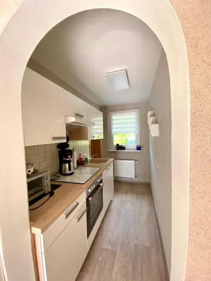 Küche/Küchenzeile in der Unterkunft Ferienhaus am Schloßpark