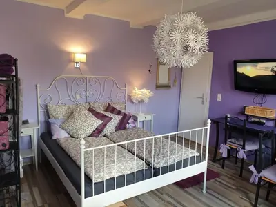 Ein Bett oder Betten in einem Zimmer der Unterkunft Ferienwohnung Leon