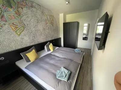 Ein Bett oder Betten in einem Zimmer der Unterkunft Stilapartment Oasis 1 #Whirlpool saisonal