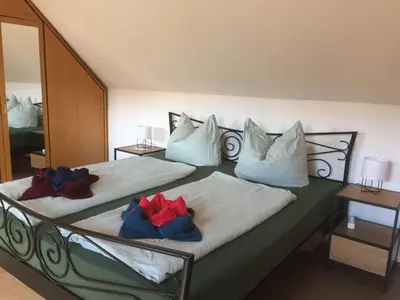 Ein Bett oder Betten in einem Zimmer der Unterkunft Ferienhaus Geiserich