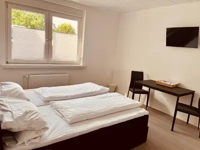 Ein Bett oder Betten in einem Zimmer der Unterkunft Apartment-am-Burgberg, Harztor