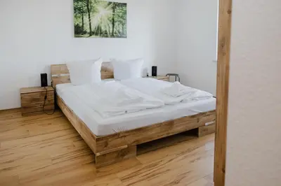 Ein Bett oder Betten in einem Zimmer der Unterkunft Ferienwohnung Spatzennest
