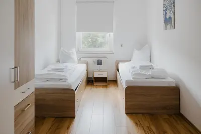 Ein Bett oder Betten in einem Zimmer der Unterkunft Ferienwohnung Spatzennest