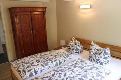 Ein Bett oder Betten in einem Zimmer der Unterkunft Ferienwohnungen Im Alten Handelshof