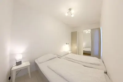 Ein Bett oder Betten in einem Zimmer der Unterkunft Apartment 547