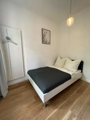 Ein Bett oder Betten in einem Zimmer der Unterkunft Prinzenhof Suite