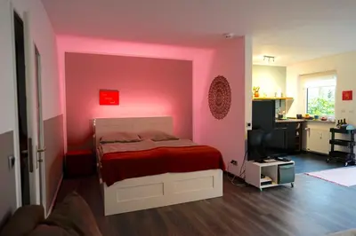 Ein Bett oder Betten in einem Zimmer der Unterkunft Liebevolles Appartement-Erholung pur in Bad Sachsa
