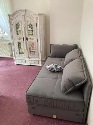 Ein Sitzbereich in der Unterkunft Villa Rosengarten