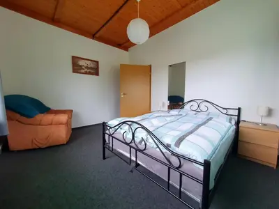 Ein Bett oder Betten in einem Zimmer der Unterkunft Ferienwohnung Stiege