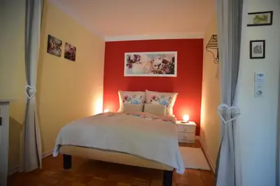Ein Bett oder Betten in einem Zimmer der Unterkunft Ferienwohnung Doretta