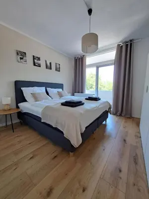 Ein Bett oder Betten in einem Zimmer der Unterkunft Harz-Glück-Fewo