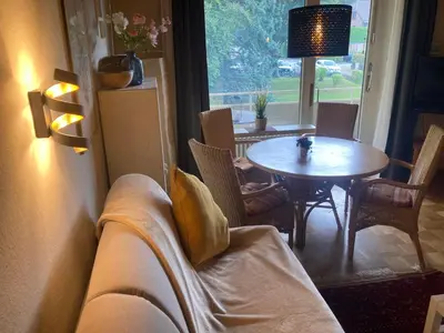 Ein Sitzbereich in der Unterkunft Gemütliche Wohnung Bergblick