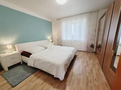 Ein Bett oder Betten in einem Zimmer der Unterkunft Ferienwohnung Bergblick in Sankt Andreasberg