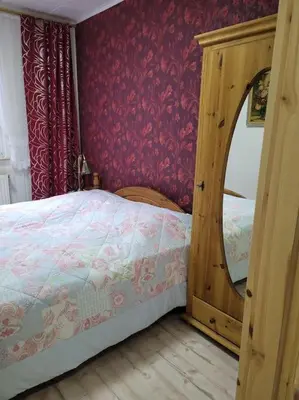 Ein Bett oder Betten in einem Zimmer der Unterkunft Ferienwohnung Harzbiene