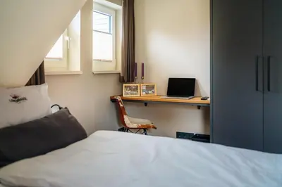 Ein Bett oder Betten in einem Zimmer der Unterkunft Baude III