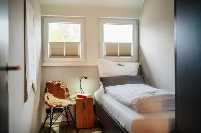 Ein Bett oder Betten in einem Zimmer der Unterkunft Baude III