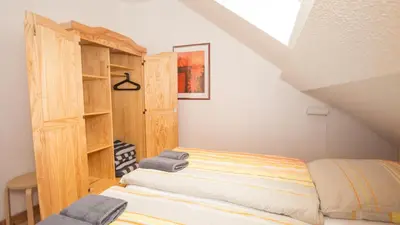 Ein Bett oder Betten in einem Zimmer der Unterkunft Ferienwohnung Forsthaus am Brocken, 80 qm, 3 Schlafzimmer F6