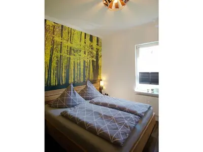 Ein Bett oder Betten in einem Zimmer der Unterkunft Ferienwohnung Busch