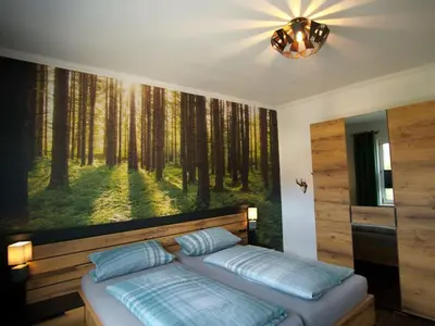 Ein Bett oder Betten in einem Zimmer der Unterkunft Ferienwohnung Busch
