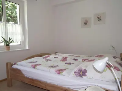Ein Bett oder Betten in einem Zimmer der Unterkunft Ferienwohnung Nexö, 30 qm, ein Schlafzimmer N1