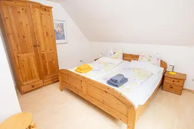 Ein Bett oder Betten in einem Zimmer der Unterkunft Ferienwohnung Nexö, 30 qm, 1 Schlafzimmer N4