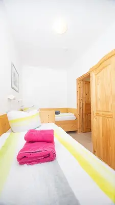 Ein Bett oder Betten in einem Zimmer der Unterkunft Ferienwohnung Forsthaus am Brocken, 40 qm, 1 Schlafzimmer F4