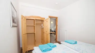 Ein Bett oder Betten in einem Zimmer der Unterkunft Ferienwohnung Forsthaus am Brocken, 60 qm, 3 Schlafzimmer F5