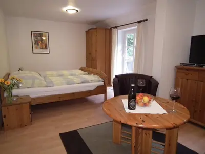 Ein Bett oder Betten in einem Zimmer der Unterkunft Ferienwohnung Nexö 25 qm, 1 Wohn-Schlafzimmer N7
